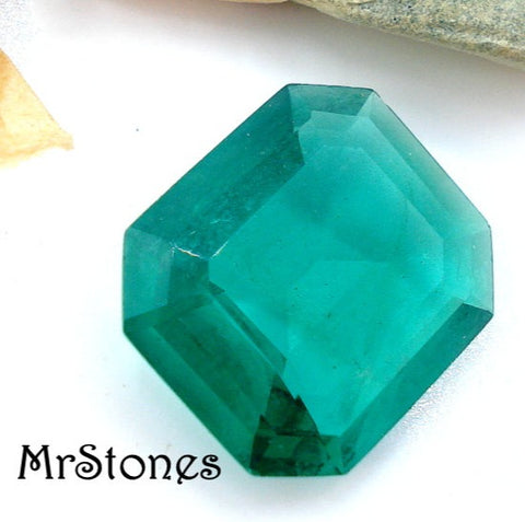 14x12mm (4610) M/C Flawed Emerald Step Cut Unfoiled Cushion Octagon