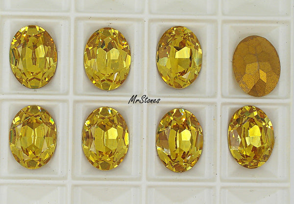 16x12mm (4140) M/C Light Topaz Oval Shape Swarovski DS Co.