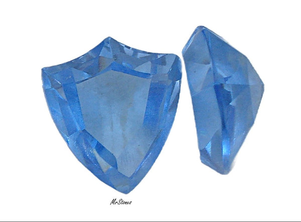 15.5x13.5mm (3294) Light Sapphire Blue Step Cut Unfoiled Shield Shape