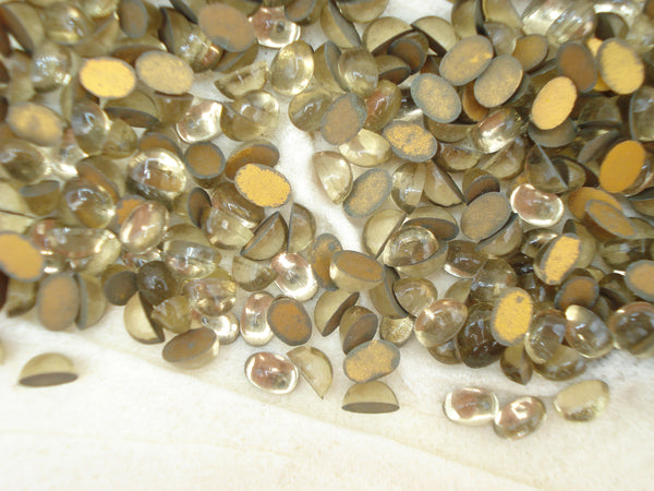 6x4mm (2195) Light Smoked Topaz Oval Cabochon W. Germany 1pc/$0.25 or 720pc/$24.95