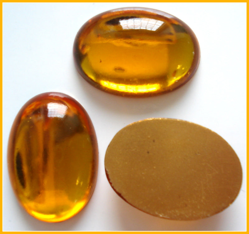 25X18MM (2195) TOPAZ COLOR OVAL CABOCHONS