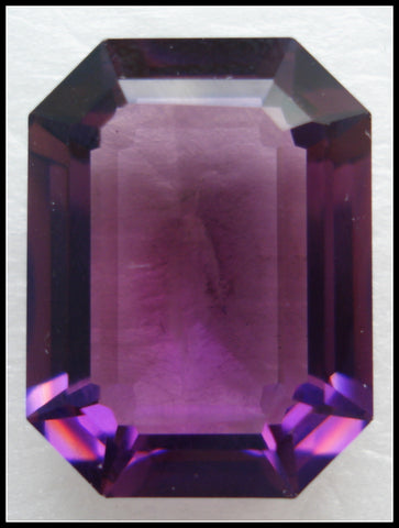 20X15MM (4610) STEP CUT UNF. AMETHYST CUSHION OCTAGON