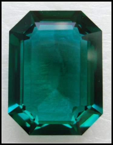 20X15MM (4610) STEP CUT UNF. EMERALD CUSHION OCTAGONS