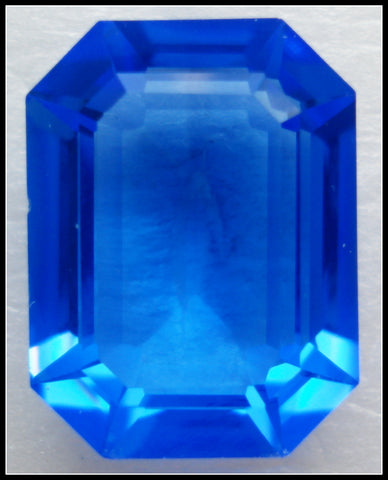 20X15MM  (4610) STEP CUT UNF. SAPPHIRE CUSHION OCTAGONS