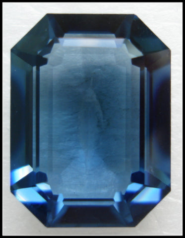 20X15MM (4610) STEP CUT UNF. MONTANA CUSHION OCTAGONS