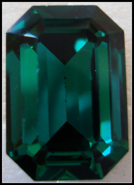 16X11MM (4610) EMERALD CUSHION OCTAGONS
