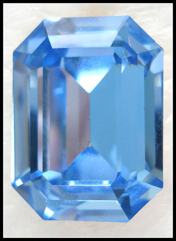 20x15mm (4610) LIGHT SAPPHIRE CUSHION OCTAGON