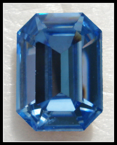 18X13MM (4600) LT SAPPHIRE CUSHION OCTAGONS
