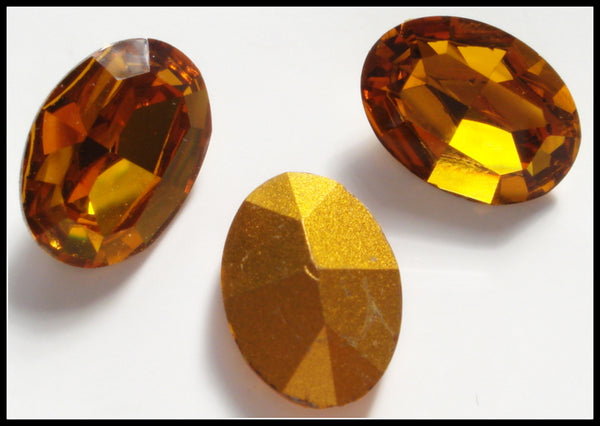 18x13mm (4100) Topaz Pointed Back Ovals