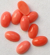 5x3mm (2195) Glass Coral Color Oval Cabochon